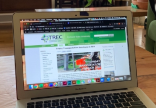 "Laptop displaying TREC website"